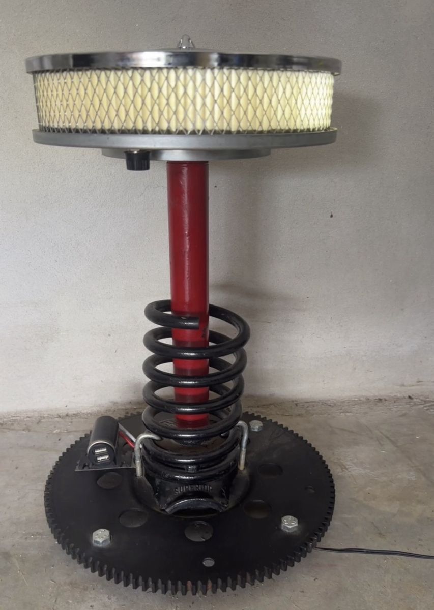 Car Part Lamp with an air-filter shade, red shock, coil spring, and flywheel gear base